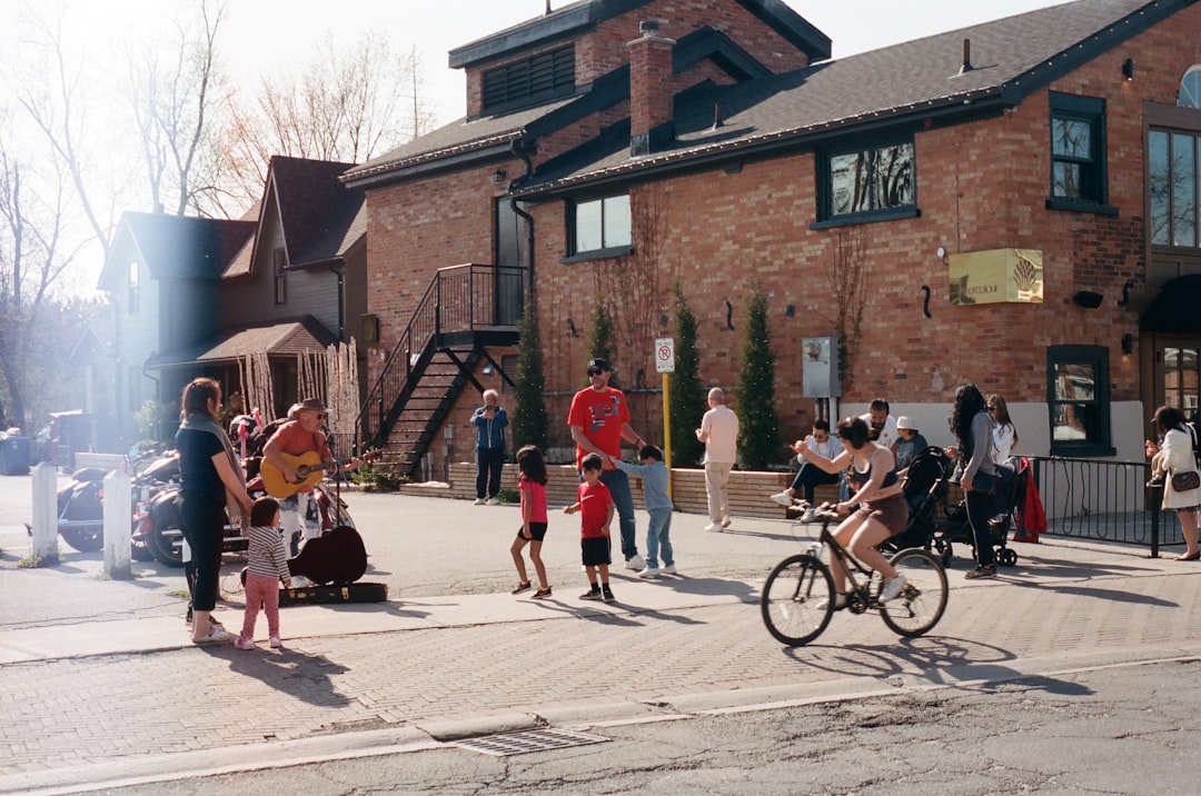A group of people standing outside of a building